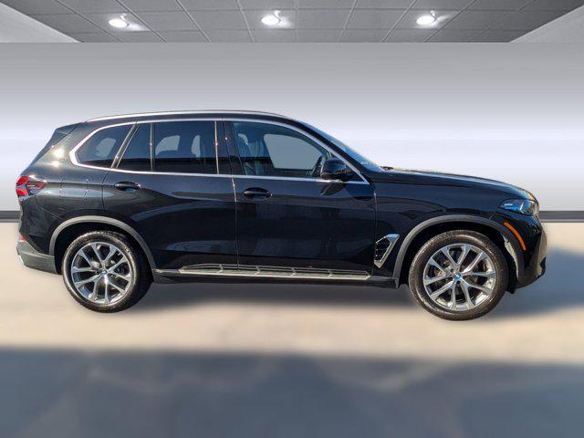 used 2025 BMW X5 PHEV car, priced at $56,899