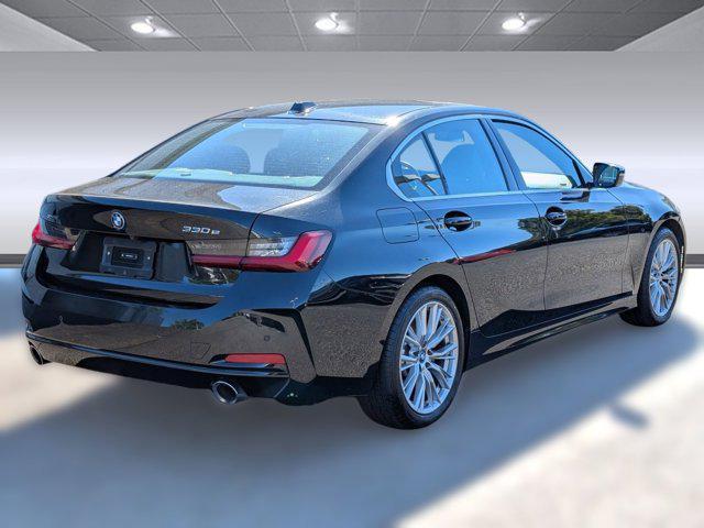 used 2024 BMW 330e car, priced at $31,396