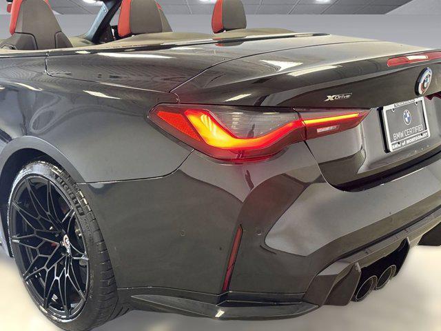 used 2023 BMW M4 car, priced at $73,999