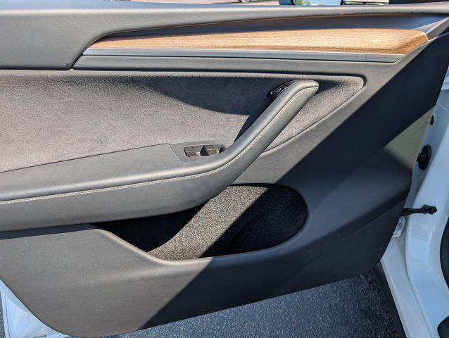 used 2025 Tesla Model Y car, priced at $35,999