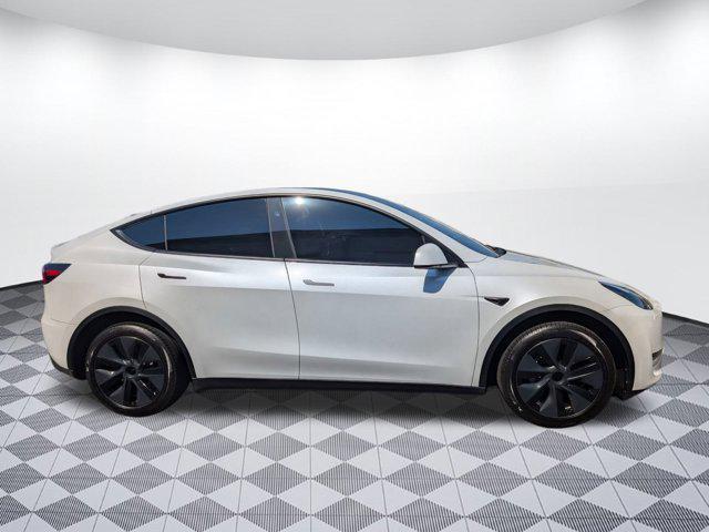used 2025 Tesla Model Y car, priced at $35,999