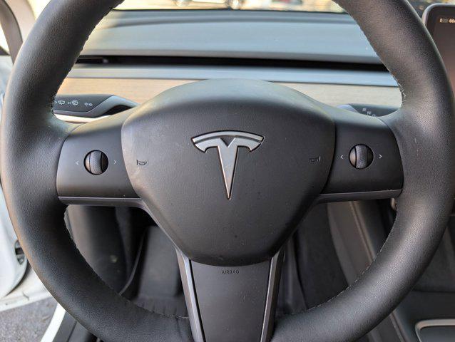 used 2025 Tesla Model Y car, priced at $35,999