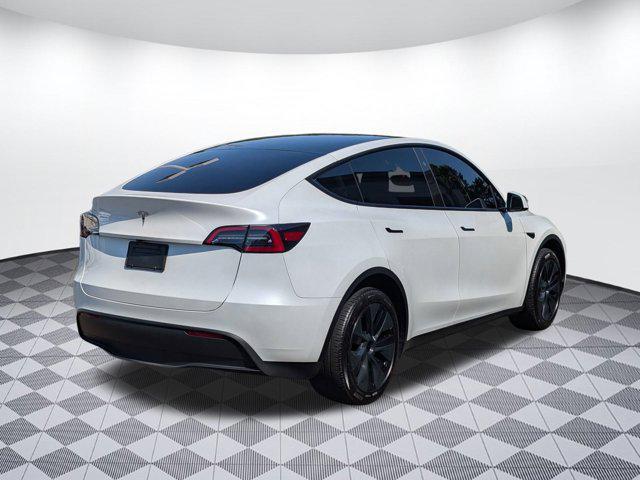 used 2025 Tesla Model Y car, priced at $35,999