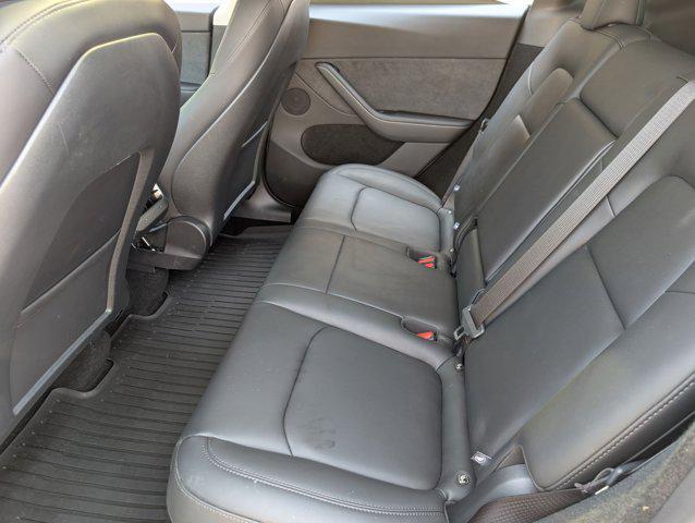 used 2025 Tesla Model Y car, priced at $35,999