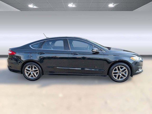 used 2014 Ford Fusion car, priced at $4,999