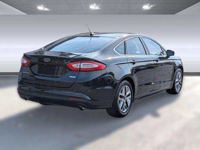 used 2014 Ford Fusion car, priced at $4,999