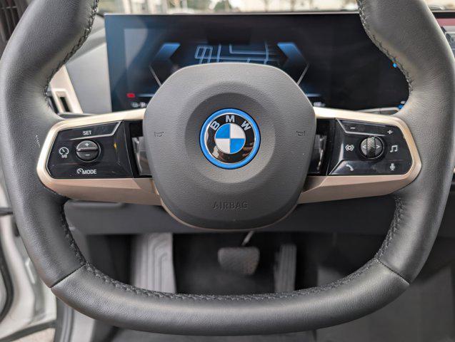 used 2024 BMW iX car, priced at $61,996