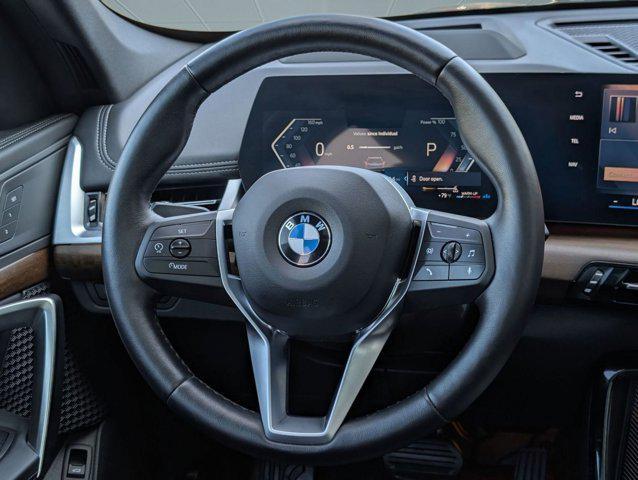 used 2025 BMW X1 car, priced at $33,697