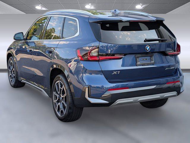 used 2025 BMW X1 car, priced at $33,697