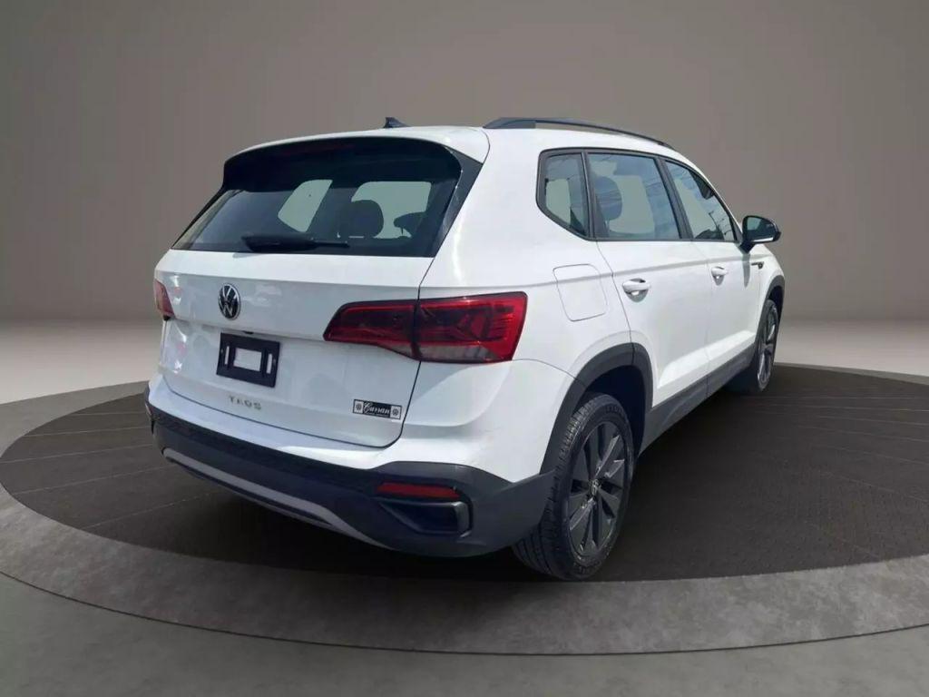 used 2022 Volkswagen Taos car, priced at $13,499