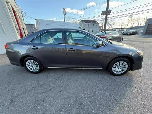 used 2014 Toyota Camry car, priced at $12,699