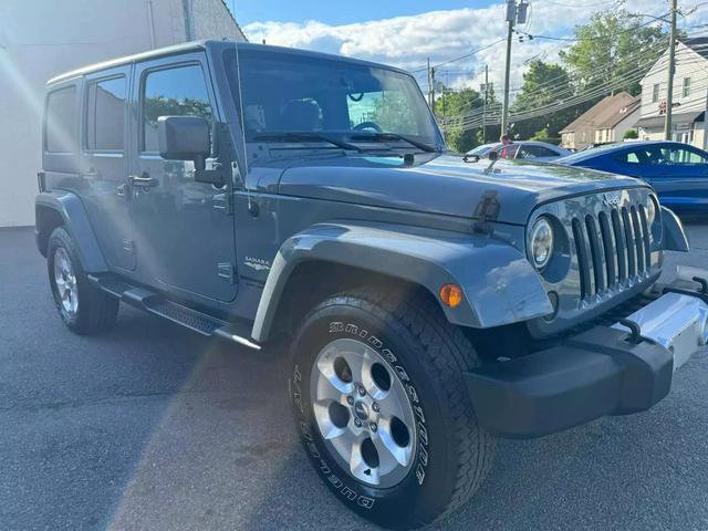 used 2014 Jeep Wrangler Unlimited car, priced at $17,499