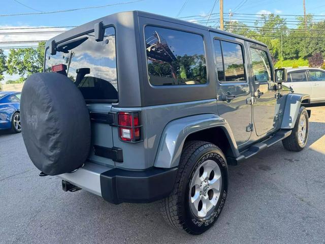 used 2014 Jeep Wrangler Unlimited car, priced at $17,499