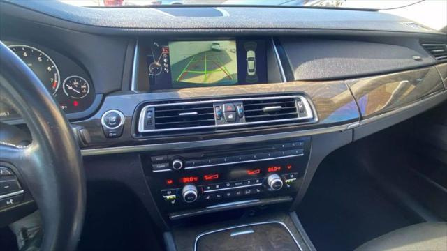 used 2013 BMW 750 car, priced at $13,499