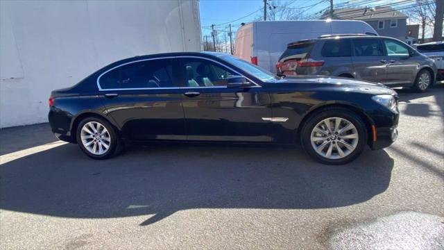 used 2013 BMW 750 car, priced at $13,499