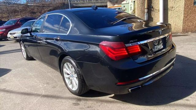 used 2013 BMW 750 car, priced at $13,499