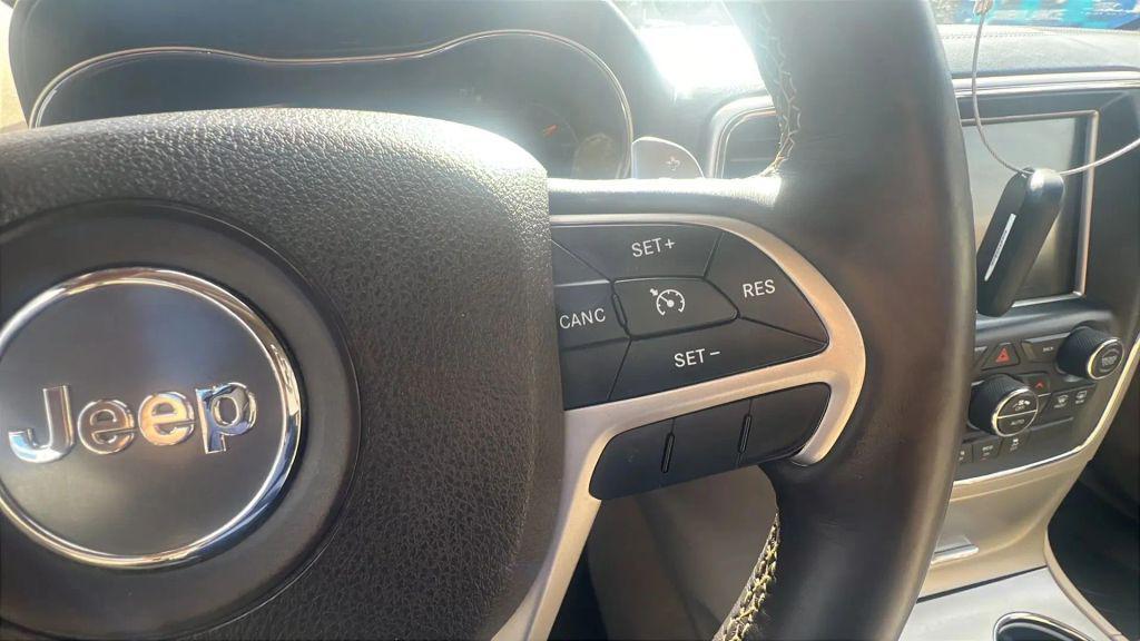 used 2014 Jeep Grand Cherokee car, priced at $10,799