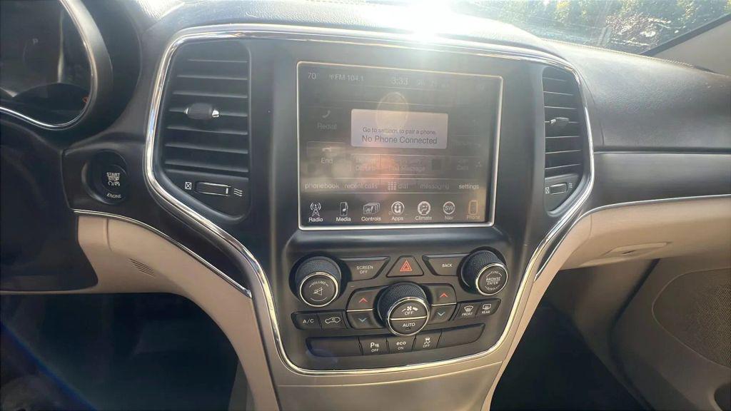 used 2014 Jeep Grand Cherokee car, priced at $10,799