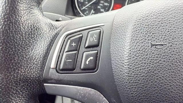 used 2015 BMW X1 car, priced at $8,799
