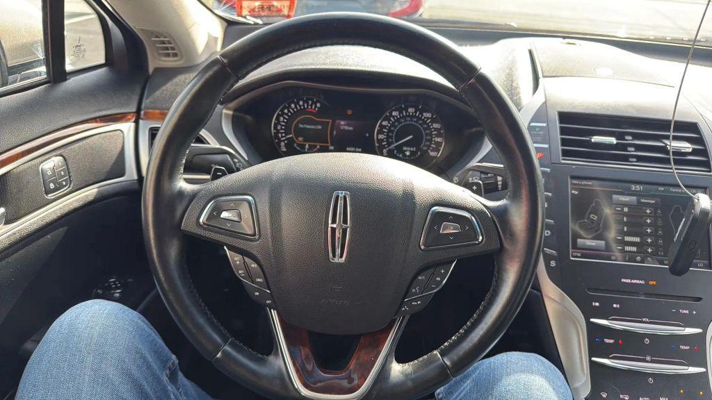used 2015 Lincoln MKZ car, priced at $12,499