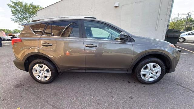 used 2015 Toyota RAV4 car, priced at $10,999