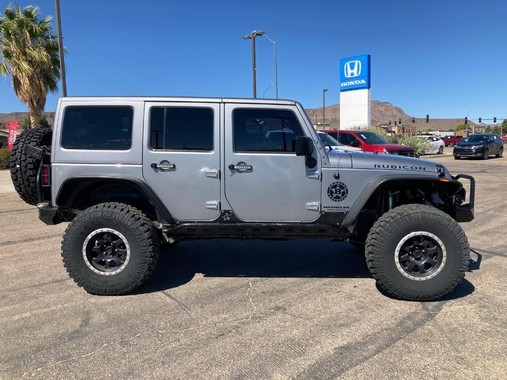 used 2014 Jeep Wrangler Unlimited car, priced at $21,950