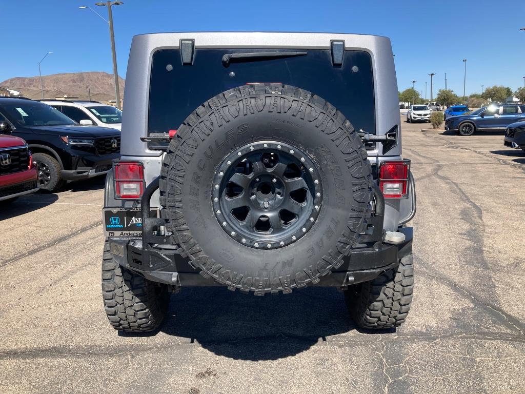 used 2014 Jeep Wrangler Unlimited car, priced at $21,950