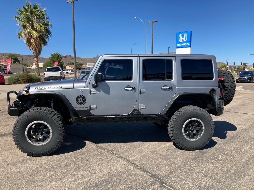 used 2014 Jeep Wrangler Unlimited car, priced at $21,950