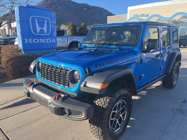 used 2024 Jeep Wrangler car, priced at $49,297