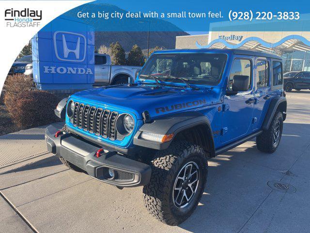 used 2024 Jeep Wrangler car, priced at $49,297