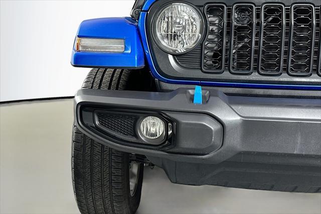 used 2024 Jeep Wrangler 4xe car, priced at $33,894