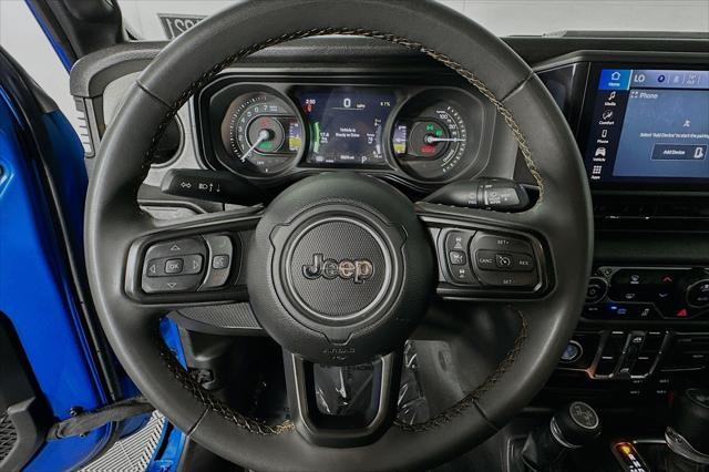 used 2024 Jeep Wrangler 4xe car, priced at $33,894
