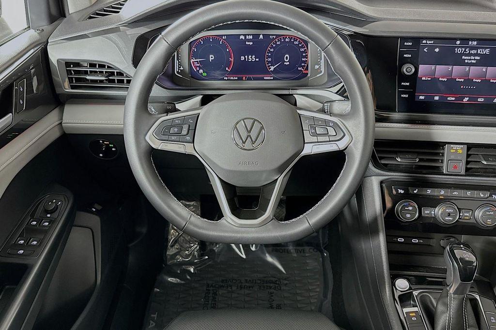 used 2024 Volkswagen Taos car, priced at $25,732