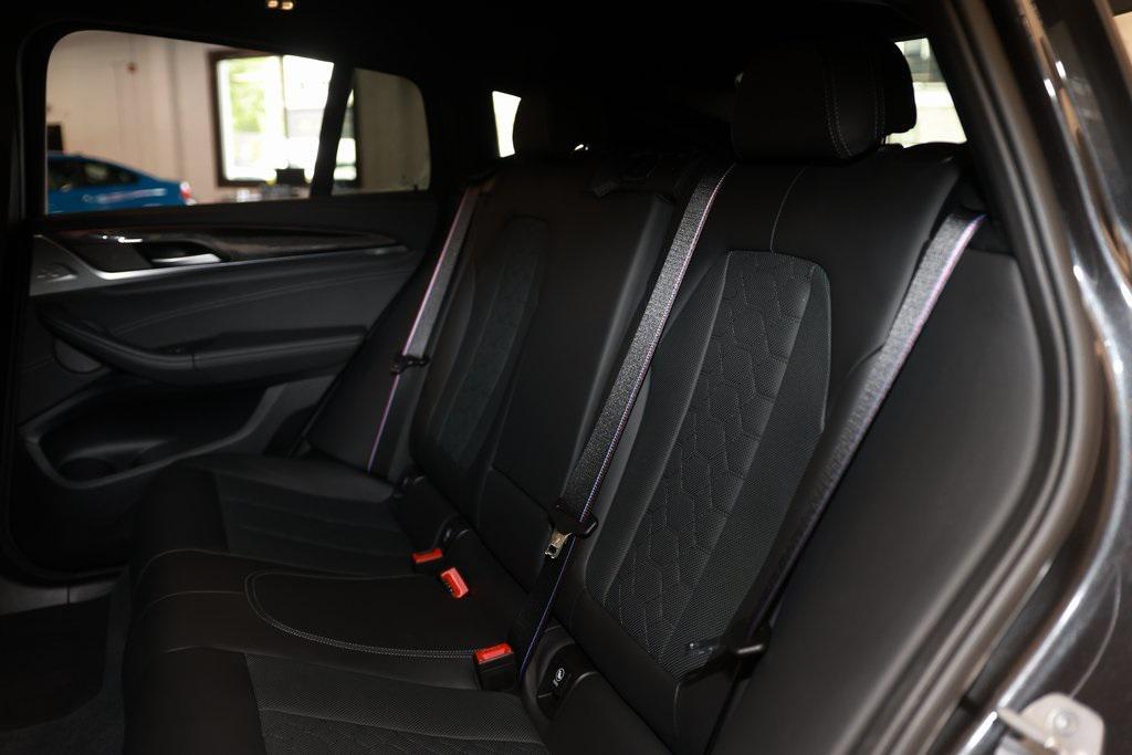 used 2023 BMW X4 M car, priced at $70,251