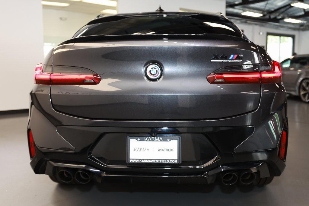 used 2023 BMW X4 M car, priced at $70,251