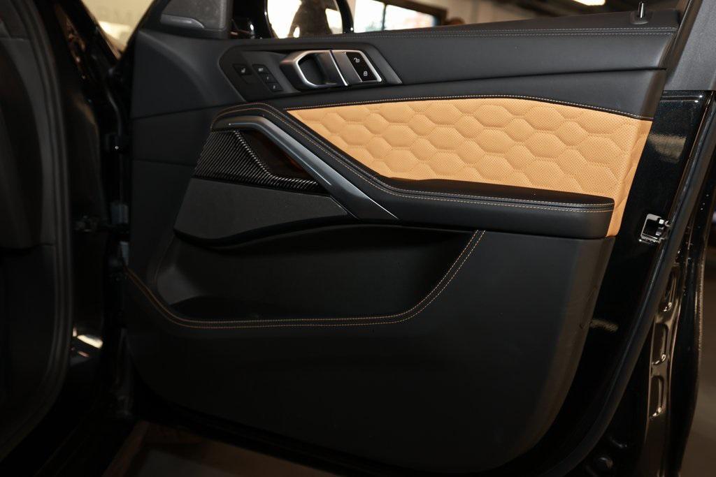 used 2022 BMW X6 M car, priced at $62,543