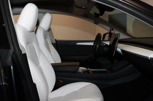used 2024 Tesla Model Y car, priced at $30,137