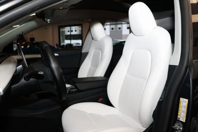 used 2024 Tesla Model Y car, priced at $30,137