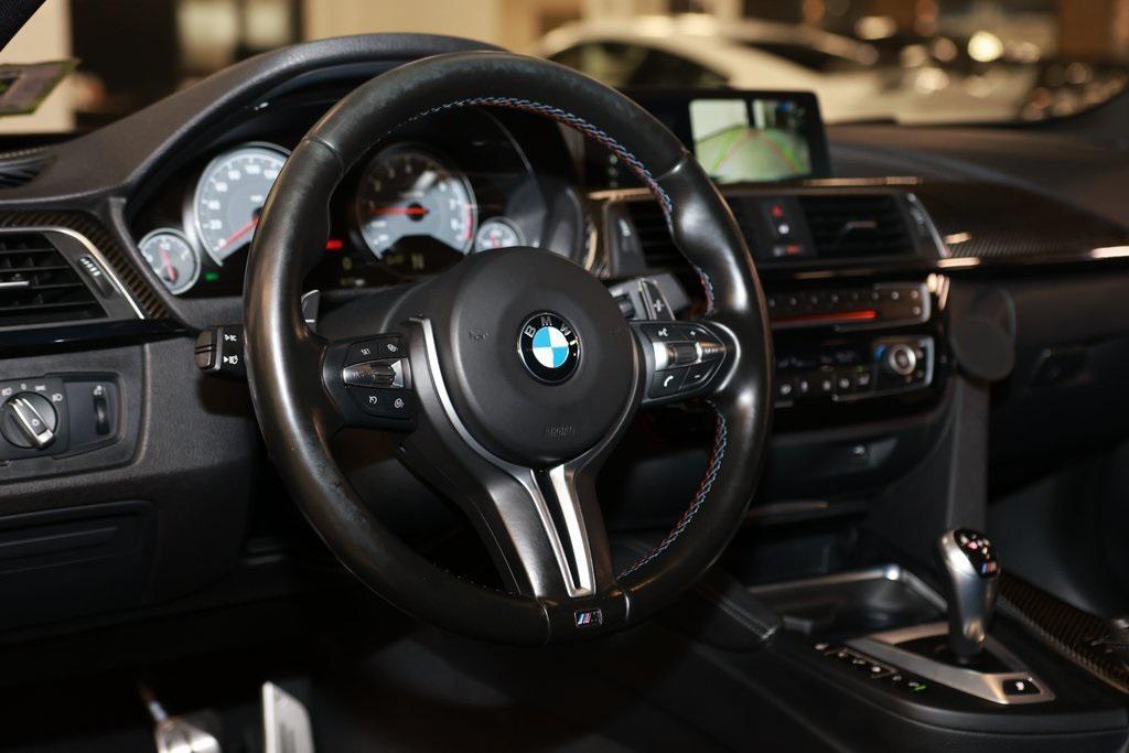 used 2018 BMW M4 car, priced at $38,452