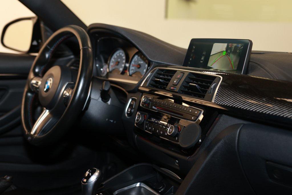 used 2018 BMW M4 car, priced at $38,452