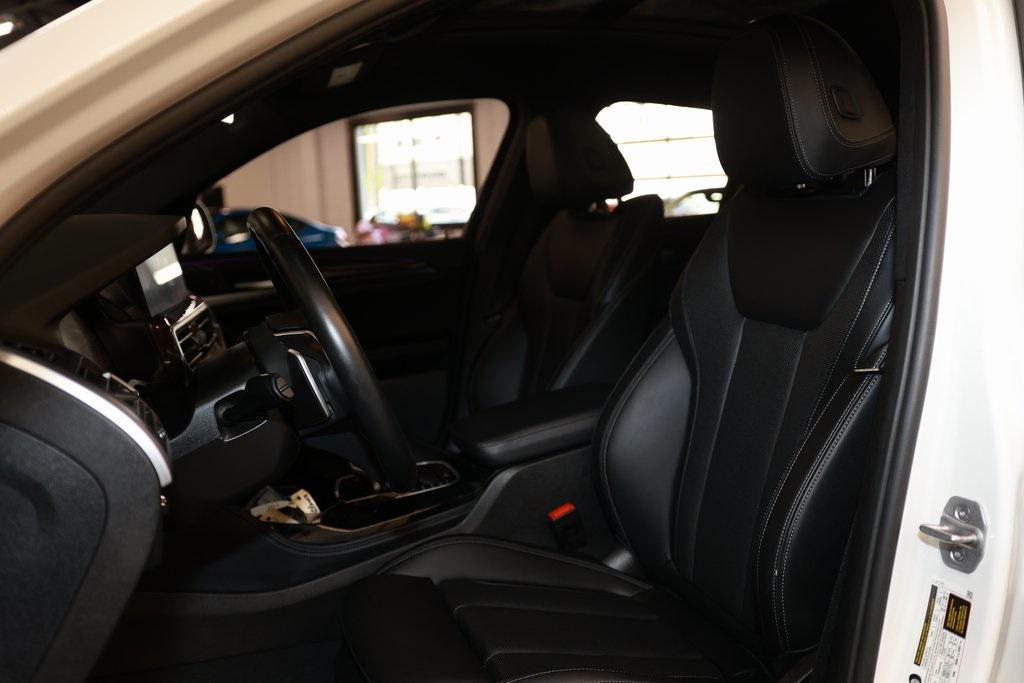 used 2025 BMW X4 car, priced at $44,934