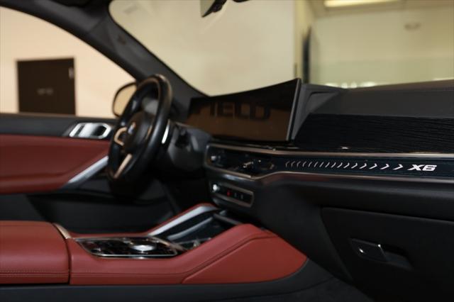 used 2024 BMW X6 car, priced at $56,162