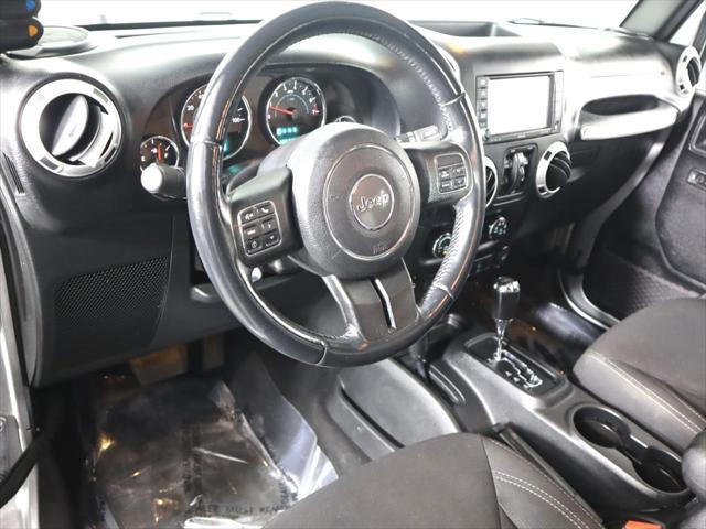 used 2015 Jeep Wrangler Unlimited car, priced at $22,495