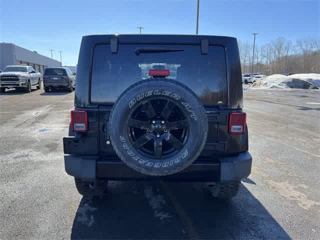 used 2014 Jeep Wrangler Unlimited car, priced at $17,291