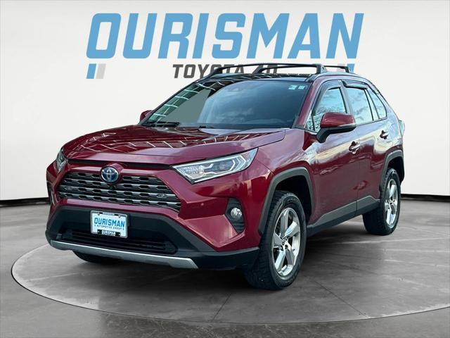 used 2021 Toyota RAV4 Hybrid car, priced at $30,000