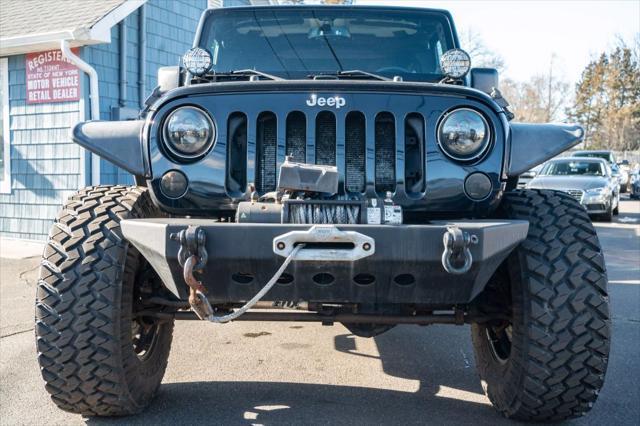 used 2014 Jeep Wrangler Unlimited car, priced at $19,995