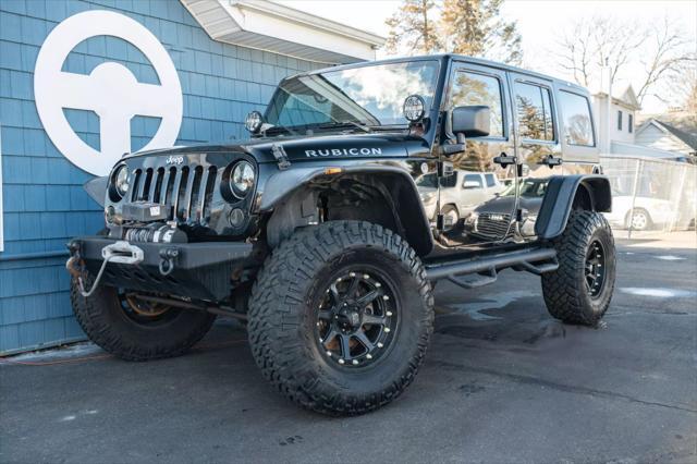 used 2014 Jeep Wrangler Unlimited car, priced at $19,995