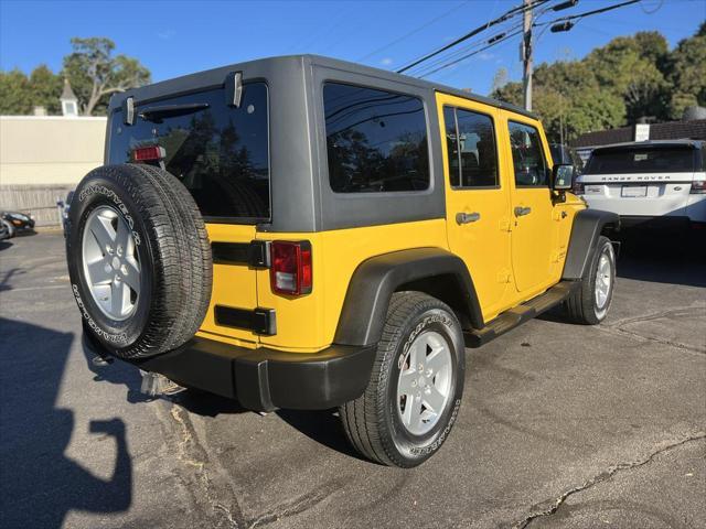 used 2011 Jeep Wrangler Unlimited car, priced at $16,995