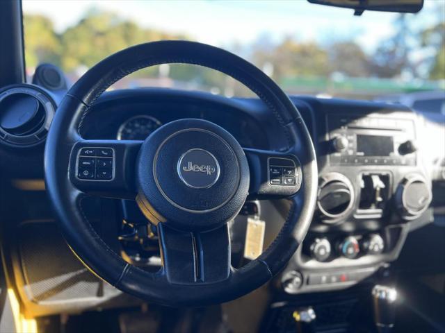 used 2011 Jeep Wrangler Unlimited car, priced at $16,995