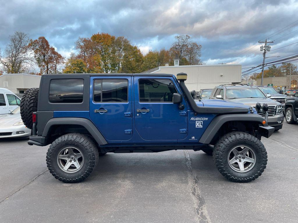 used 2009 Jeep Wrangler Unlimited car, priced at $13,995
